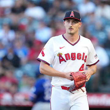 Jul 10, 2025; Anaheim, California, USA; Los Angeles Angels starting pitcher Jack Kochanowicz (41) reacts at the end of the first inning against the Texas Rangers at Angel Stadium. Mandatory Credit: Kirby Lee-Imagn Images
