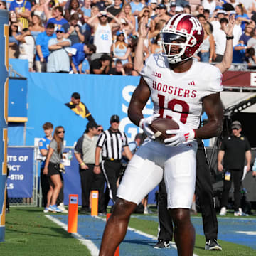 Indiana Hoosiers wide receiver Miles Cross (19) celebrates after scoring on a 3-yard touchdown reception against the UCLA Bruins in the first half at Rose Bowl.