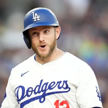 May 7, 2024; Los Angeles, California, USA; Los Angeles Dodgers third baseman Max Muncy (13) celebrates after hitting a grand slam in the first inning against the Miami Marlins at Dodger Stadium. Mandatory Credit: Kirby Lee-USA TODAY Sports