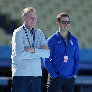 Apr 1, 2024; Los Angeles, California, USA; Spectrum SportsNet LA commentator Orel Hershiser (left) and play-by-play announcer Joe Davis during the game between the San Francisco Giants and Los Angeles Dodgers at Dodger Stadium. Mandatory Credit: Kirby Lee-Imagn Images