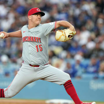 May 16, 2024; Los Angeles, California, USA; Cincinnati Reds pitcher Emilio Pagan (15) throws in the first inning against the Los Angeles Dodgers  at Dodger Stadium. Mandatory Credit: Kirby Lee-USA TODAY Sports