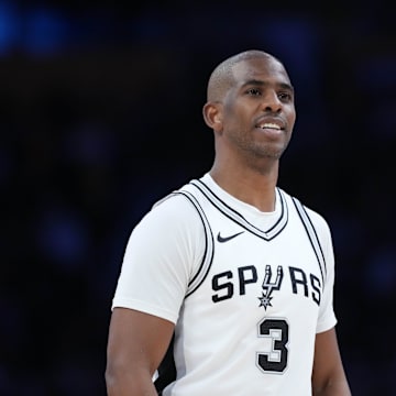 Mar 17, 2025; Los Angeles, California, USA; San Antonio Spurs guard Chris Paul (3) reacts against the Los Angeles Lakers in the first half at Crypto.com Arena. Mandatory Credit: Kirby Lee-Imagn Images