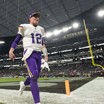 Dec 10, 2023; Paradise, Nevada, USA; Minnesota Vikings quarterback Nick Mullens (12) celebrates after the game against the Las Vegas Raiders at Allegiant Stadium. Mandatory Credit: Kirby Lee-Imagn Images