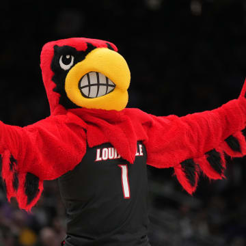 Mar 26, 2023; Seattle, WA, USA; Louisville Cardinals mascot Louie gestures in the first half against the Iowa Hawkeyes at Climate Pledge Arena. 