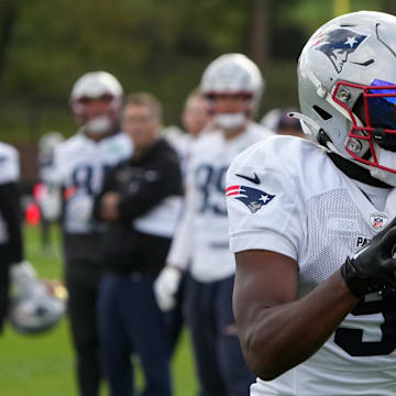 Oct 18, 2024; London, United Kingdom; New England Patriots wide receiver Kayshon Boutte (9) catches the ball during practice at the Harrow School. Mandatory Credit: Kirby Lee-Imagn Images