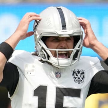 Sep 8, 2024; Inglewood, California, USA; Las Vegas Raiders quarterback Gardner Minshew (15) prepares to take the snap against the Los Angeles Chargers in the first half at SoFi Stadium. Mandatory Credit: Kirby Lee-Imagn Images