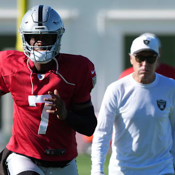 Jul 24, 2025; Henderson, NV, USA; Las Vegas Raiders quarterback Geno Smith (7) with coach Pete Carroll during training camp at the Intermountain Healthcare Performance Center. Mandatory Credit: Kirby Lee-Imagn Images
