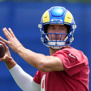 Jun 3, 2025; Woodland Hills, CA, USA; Los Angeles Rams quarterback Matthew Stafford (9) throws the ball during organized team activities at Rams Practice Facility. Mandatory Credit: Kirby Lee-Imagn Images