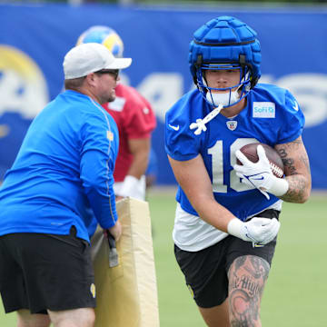 Jun 3, 2025; Woodland Hills, CA, USA; Los Angeles Rams tight end Terrance Ferguson (18) carries the ball during organized team activities at Rams Practice Facility. Mandatory Credit: Kirby Lee-Imagn Images