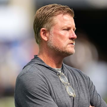 Aug 9, 2025; Inglewood, California, USA; Los Angeles Rams general manager Les Snead watches during the game against the Dallas Cowboys at SoFi Stadium. Mandatory Credit: Kirby Lee-Imagn Images
