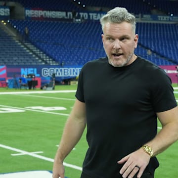 Pat McAfee watches during workouts at the 2025 NFL Scouting Combine at Lucas Oil Stadium.