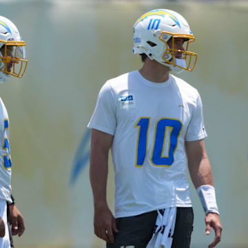 Los Angeles Chargers quarterbacks Trey Lance (5) and Justin Herbert (10) during organized team activities at The Bolt. 
