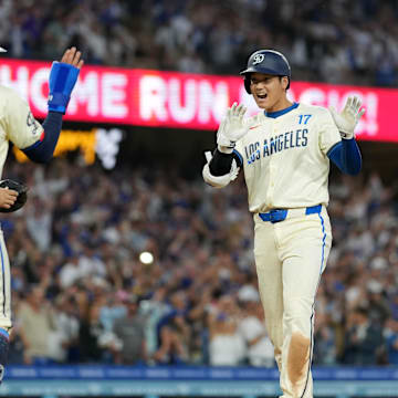 Rojas (#11) and Ohtani (#17) helped the Dodgers capture its second straight championship. 