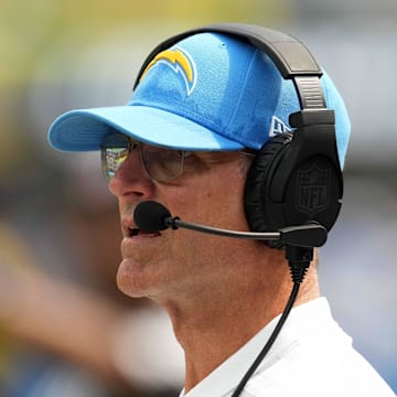 Sep 8, 2024; Inglewood, California, USA; Los Angeles Chargers coach Jim Harbaugh watches from the sidelines in the first half against the Las Vegas Raiders at SoFi Stadium. Mandatory Credit: Kirby Lee-Imagn Images