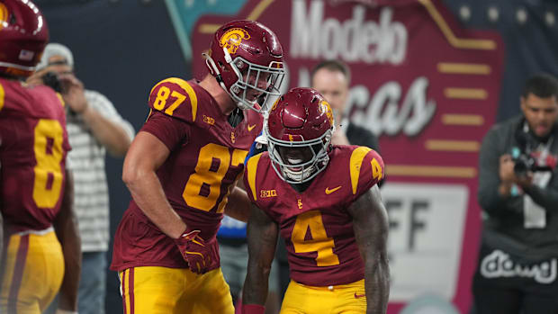 Sep 1, 2024; Paradise, Nevada, USA; Southern California Trojans running back Woody Marks (4) celebrates with tight end Lake M