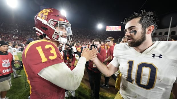 Southern California Trojans quarterback Caleb Williams (13) and Notre Dame Fighting Irish quarterback Drew Pyne 