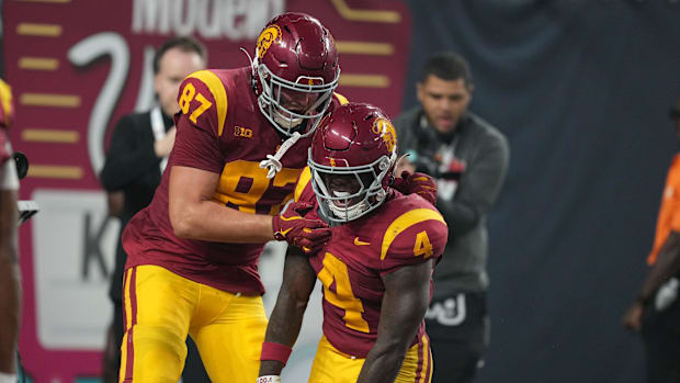 Lake McRee and Woody Marks celebrate in the end zone