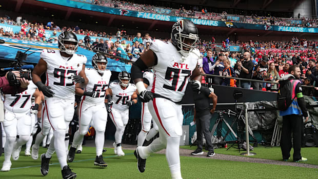 Grady Jarrett, Calais Campbell and Matthew Bergeron enter the field against Jacksonville at London. Grady Jarrett, Calais Campbell and Matthew Bergeron enter the field against Jacksonville at London.