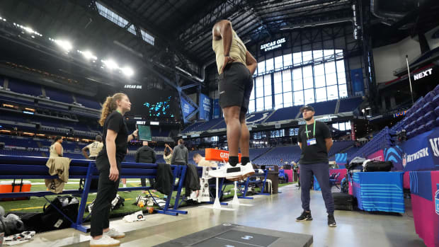 Mar 3, 2024; Indianapolis, IN, USA; Hawkin Dynamics specialist Cat Moss (left) and James Hanisch