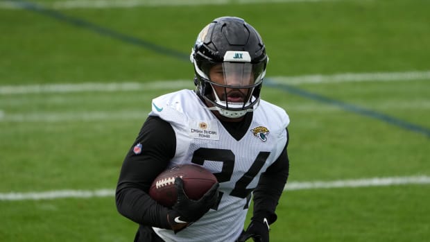 acksonville Jaguars running back Snoop Conner (24) carries the ball during practice at Hanbury Manor Marriott. 