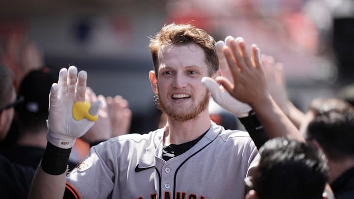 Apr 20, 2025; Anaheim, California, USA; San Francisco Giants catcher Sam Huff (23) celebrates with teammates after scoring on a two-run home run by first baseman David Villar (not pictured) in the sixth inning against the Los Angeles Angels at Angel Stadium. Mandatory Credit: Kirby Lee-Imagn Images