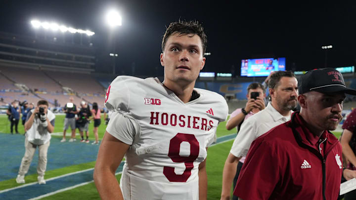 Sep 14, 2024; Pasadena, California, USA; Indiana Hoosiers quarterback Kurtis Rourke (9) leaves the field after the game against the UCLA Bruins at Rose Bowl. Mandatory Credit: Kirby Lee-Imagn Images