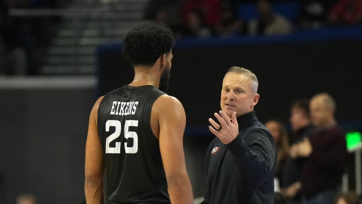 Dec 19, 2023; Los Angeles, California, USA; Cal State Northridge Matadors head coach Andy Newman (right) talks with forward De'Sean Allen-Eikens (25) against the UCLA Bruins in the second half at Pauley Pavilion presented by Wescom. CSUN defeated UCLA 76-72. Mandatory Credit: Kirby Lee-USA TODAY Sports