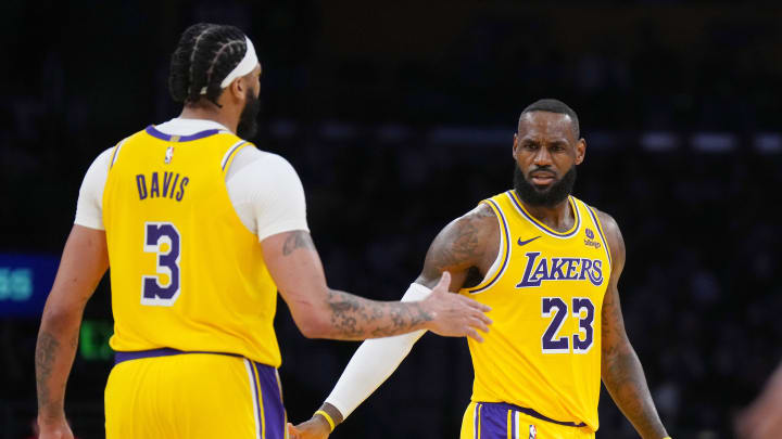 Mar 18, 2024; Los Angeles, California, USA; Los Angeles Lakers forward LeBron James (23) and forward Anthony Davis (3 celebrate against the Atlanta Hawks in the second half at Crypto.com Arena. Mandatory Credit: Kirby Lee-USA TODAY Sports