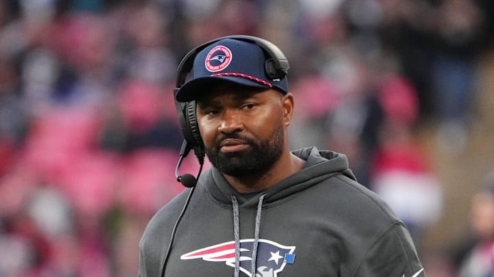 Oct 20, 2024; London, United Kingdom; New England Patriots coach Jerod Mayo watches from the sidelines against the New England Patriots in the second half of an NFL International Series game at Wembley Stadium. Mandatory Credit: Kirby Lee-Imagn Images