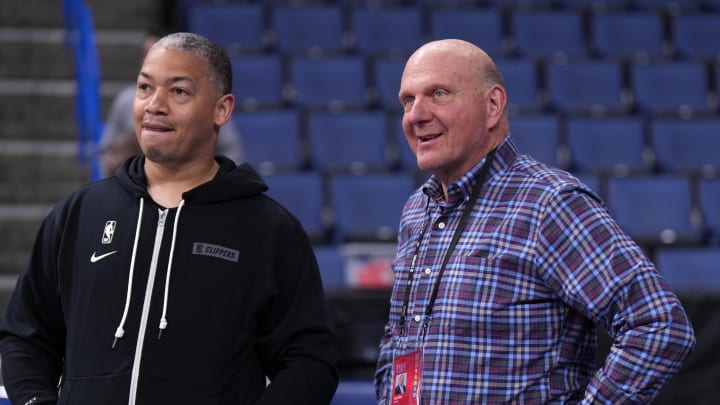 Oct 12, 2022; Ontario, California, USA; LA Clippers coach Tyronn Lue (left) talks with owner Steve Ballmer before the game against the Denver Nuggets at Toyota Arena. Mandatory Credit: Kirby Lee-USA TODAY Sports