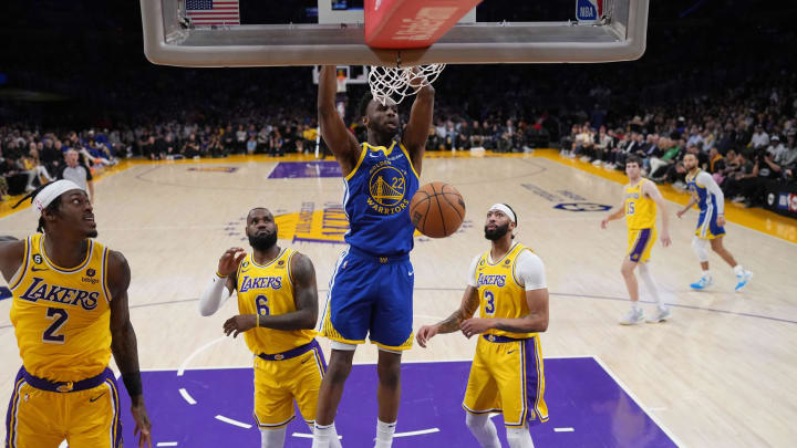 May 8, 2023; Los Angeles, California, USA; Andrew Wiggins dunks the ball against Los Angeles Lakers forward Jarred Vanderbilt (2), forward LeBron James (6) and forward Anthony Davis (3) in the first half of game four of the 2023 NBA playoffs at Crypto.com Arena. Mandatory Credit: Kirby Lee-USA TODAY Sports