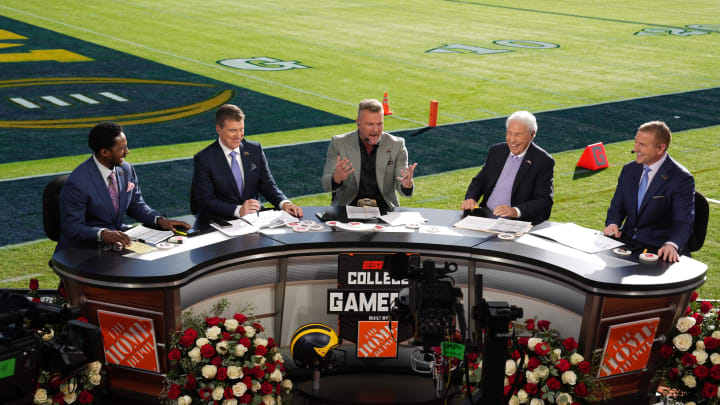 Jan 1, 2024; Pasadena, CA, USA; From left: Desmond Howard, Rece Davis, Pat McAfee, Lee Corso and Kirk Herbstreit on the ESPN College Gameday set at the 2024 Rose Bowl college football playoff semifinal game at Rose Bowl. Mandatory Credit: Kirby Lee-USA TODAY Sports