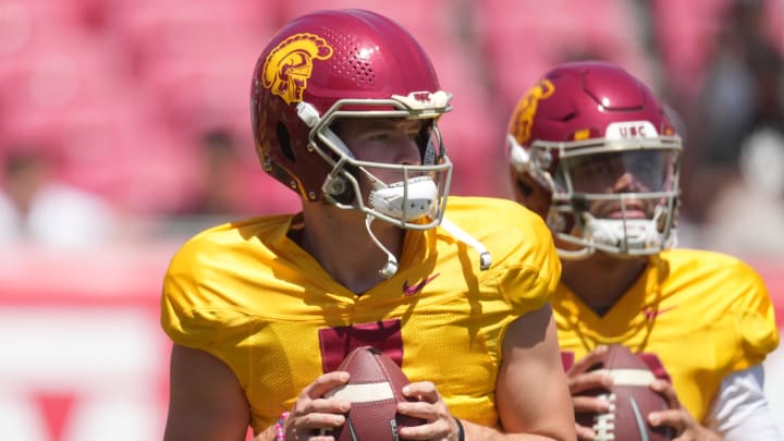 Apr 23, 2022; Los Angeles, CA, USA; Southern California Trojans quarterbacks Miller Moss (7) and Caleb Williams (13) throw the ball during the spring game at the Los Angeles Memorial Coliseum. Mandatory Credit: Kirby Lee-USA TODAY Sports