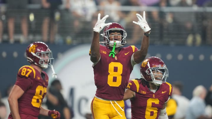 Sep 1, 2024; Paradise, Nevada, USA; Southern California Trojans wide receiver Ja'Kobi Lane (8) and wide receiver Makai Lemon (6 celebrate after a touchdown in the fourth quarter against the LSU Tigers at Allegiant Stadium. Mandatory Credit: Kirby Lee-USA TODAY Sports