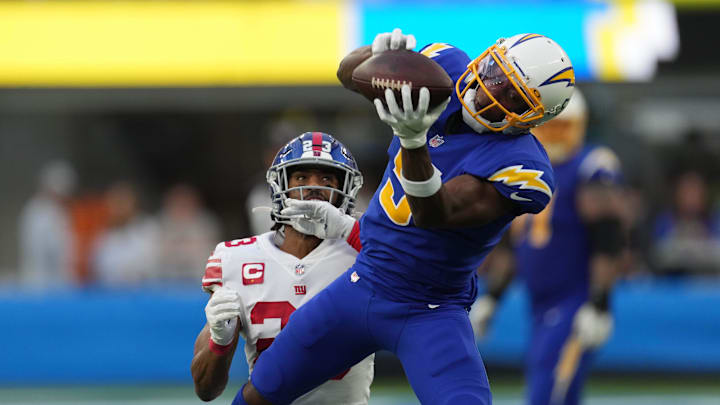 Dec 12, 2021; Inglewood, California, USA; Los Angeles Chargers wide receiver Josh Palmer (5) catches a pass as New York Giants safety Logan Ryan (23) defends Dec 12, 2021; Inglewood, California, USA; Los Angeles Chargers wide receiver Josh Palmer (5) catches a pass as New York Giants safety Logan Ryan (23) defends