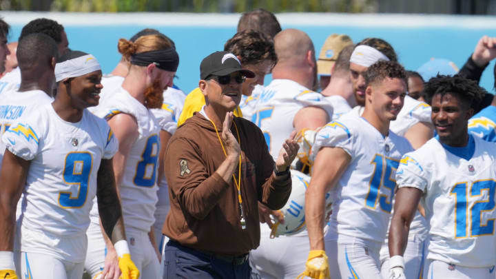 Jun 13, 2024; Costa Mesa, CA, USA; Los Angeles Chargers coach Jim Harbaugh interacts with his team during minicamp at the Hoag Performance Center. Mandatory Credit: Kirby Lee-USA TODAY Sports