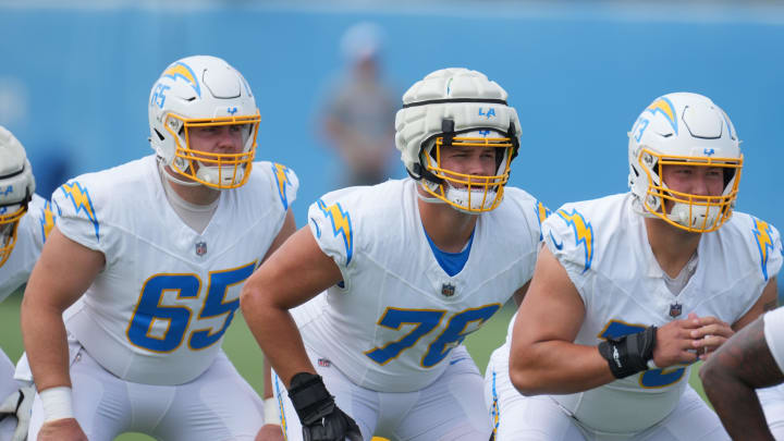 Jun 13, 2024; Costa Mesa, CA, USA; Los Angeles Chargers center Brent Laing (65), offensive tackle Joe Alt (76) and offensive tackle Foster Sarell (73) during minicamp at the Hoag Performance Center. Mandatory Credit: Kirby Lee-USA TODAY Sports