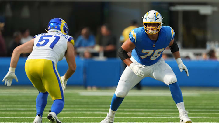 Aug 17, 2024; Inglewood, California, USA; Los Angeles Chargers offensive tackle Joe Alt (76) defends against Los Angeles Rams linebacker Zach VanValkenburg (51) in the first half at SoFi Stadium. Mandatory Credit: Kirby Lee-Imagn Images