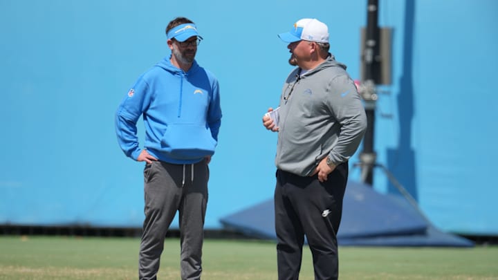 Jun 13, 2024; Costa Mesa, CA, USA; Los Angeles Chargers offensive coordinator Greg Roman (left) and quarterbacks coach Shane Day during minicamp at the Hoag Performance Center. Mandatory Credit: Kirby Lee-Imagn Images