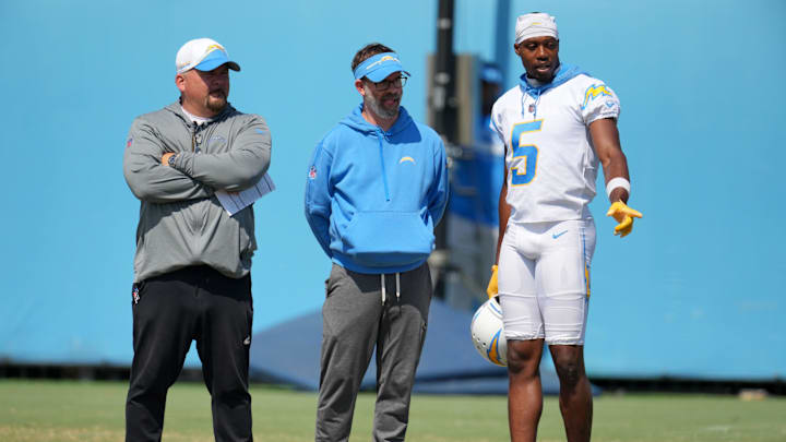 Jun 13, 2024; Costa Mesa, CA, USA; Los Angeles Chargers offensive coordinator Greg Roman (left), quarterbacks coach Shane Day (center) and wide receiver Joshua Palmer (5) during minicamp at the Hoag Performance Center. Mandatory Credit: Kirby Lee-Imagn Images