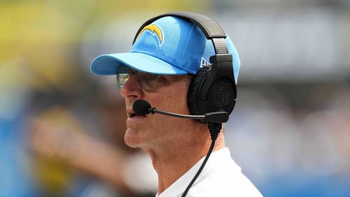 Sep 8, 2024; Inglewood, California, USA; Los Angeles Chargers coach Jim Harbaugh watches from the sidelines in the first half against the Las Vegas Raiders at SoFi Stadium. Mandatory Credit: Kirby Lee-Imagn Images