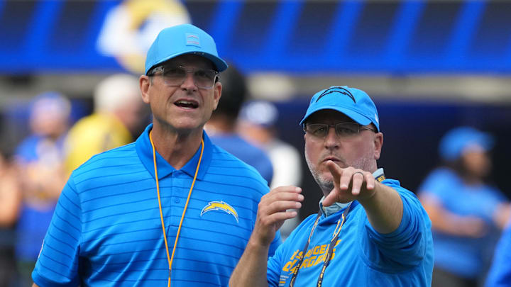 Aug 16, 2025; Inglewood, California, USA; Los Angeles Chargers coach Jim Harbaugh (left) and general manager Joe Hortiz react during the game against the Los Angeles Rams at SoFi Stadium. Mandatory Credit: Kirby Lee-Imagn Images Aug 16, 2025; Inglewood, California, USA; Los Angeles Chargers coach Jim Harbaugh (left) and general manager Joe Hortiz react during the game against the Los Angeles Rams at SoFi Stadium. Mandatory Credit: Kirby Lee-Imagn Images
