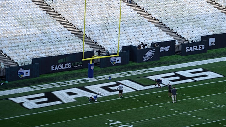 Sep 5, 2024; Sao Paolo, Brazil; Workers paint the Philadelphia Eagles logo in thee end zone prior to the 2024 NFL Sao Paolo game at Neo Química Arena. Mandatory Credit: Kirby Lee-Imagn Images