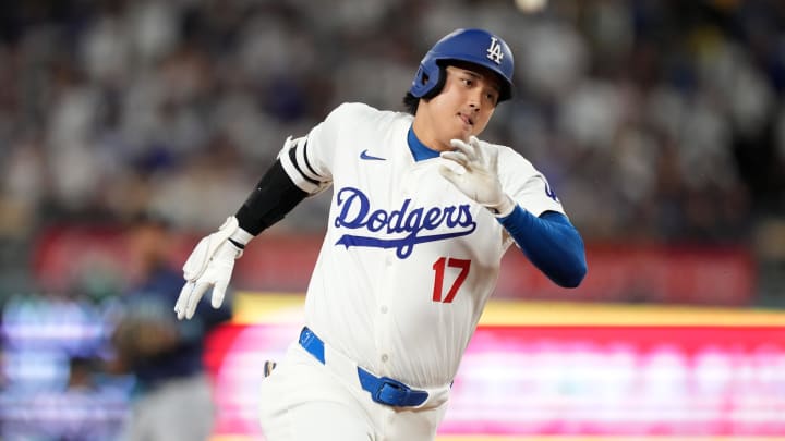 Los Angeles Dodgers designated hitter Shohei Ohtani (17) runs the bases after hitting a triple in the third inning against the Seattle Mariners at Dodger Stadium on Aug 20.