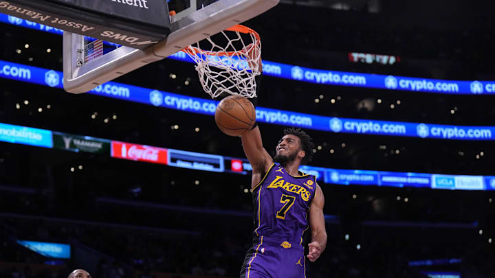 Nov 4, 2022; Los Angeles, California, USA; Los Angeles Lakers forward Troy Brown Jr. (7) dunks the ball against the Utah Jazz  in the first half at Crypto.com Arena. Mandatory Credit: Kirby Lee-Imagn Images