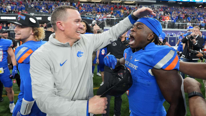 Dec 2, 2023; Las Vegas, NV, USA; Boise State Broncos head coach Spencer Danielson celebrates with running back Ashton Jeanty (2) after 44-20 victory over the UNLV Rebels in the Mountain West Championship at Allegiant Stadium. Mandatory Credit: Kirby Lee-USA TODAY Sports