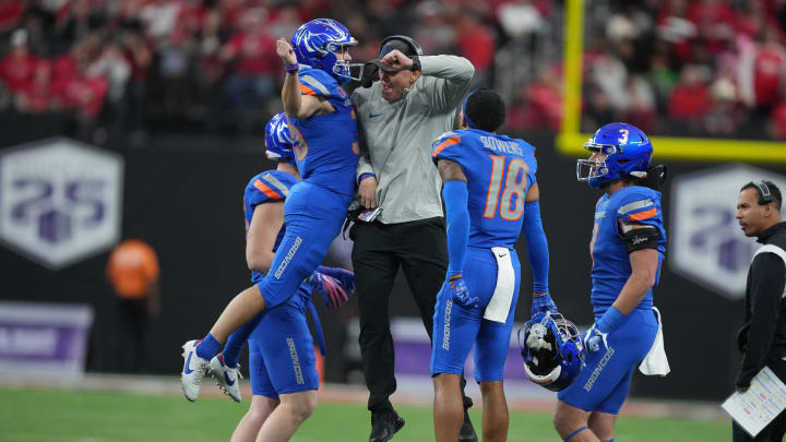 Dec 2, 2023; Las Vegas, NV, USA; Boise State Broncos head coach Spencer Danielson celebrates with Boise State Broncos tight end Matt Lauter (85) in the second half against the UNLV Rebels during the Mountain West Championship at Allegiant Stadium. Mandatory Credit: Kirby Lee-USA TODAY Sports