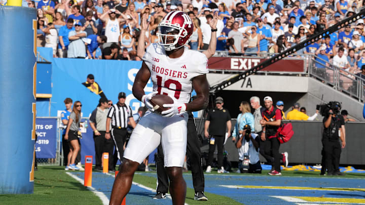 Indiana Hoosiers wide receiver Miles Cross (19) celebrates after scoring on a 3-yard touchdown reception against the UCLA Bruins in the first half at Rose Bowl.