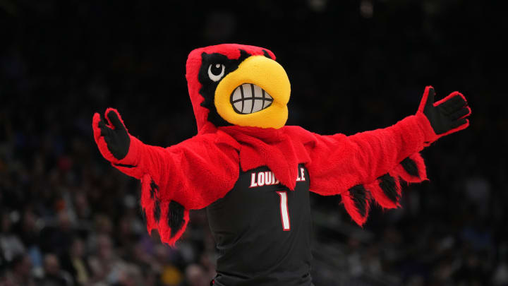 Mar 26, 2023; Seattle, WA, USA; Louisville Cardinals mascot Louie gestures in the first half against the Iowa Hawkeyes at Climate Pledge Arena. 
