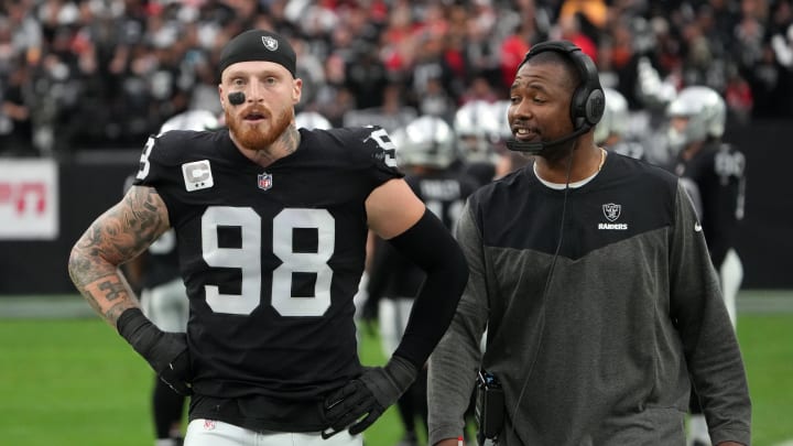 Jan 7, 2023; Paradise, Nevada, USA; Las Vegas Raiders defensive end Maxx Crosby (98) and defensive coordinator Patrick Graham talk during their game against the Kansas City Chiefs in the first half at Allegiant Stadium. Mandatory Credit: Kirby Lee-USA TODAY Sports